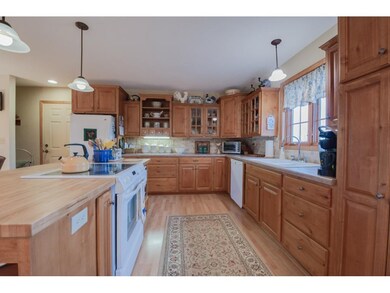 Alternate view of the kitchen showcases large cent