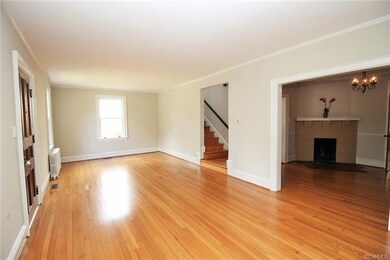 Wide, double-member baseboards w/ Adams casing, and traditional picture rail crown