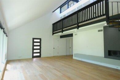 Garage featuring baseboards