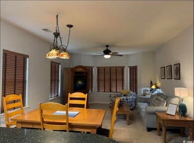 Dining area featuring a ceiling fan