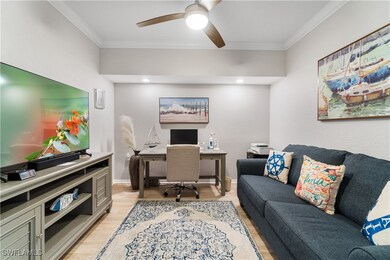Office featuring ornamental molding, ceiling fan,