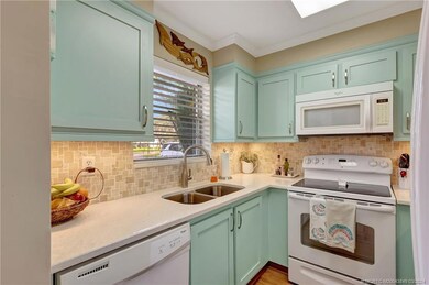 Silestone Counter with Stone Backsplash