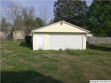 Additional detached 2 car garage/workshop.