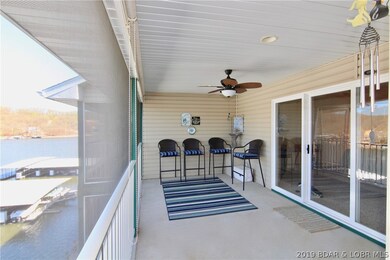 Screened-in deck with plenty of room for entertain