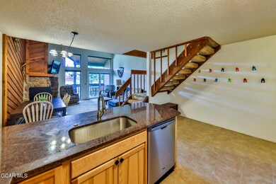 kitchen into living + dining