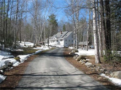 Exterior Front. Picturesque Driveway