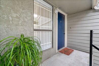 At the top of the stairs, a spacious private balco