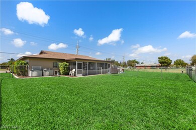 Ground view of backyard.   Unit 2 is on left.