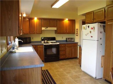 Kitchen. Upgraded cupboards and pantry.  Appliance