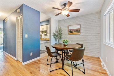Front room staged as dining room, but could be used as another living room or office.