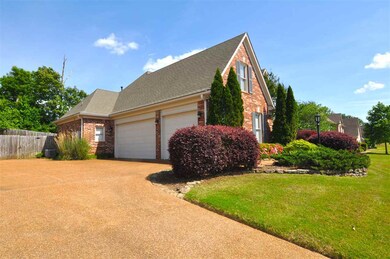 A 3-car garage is located to the side of the home 