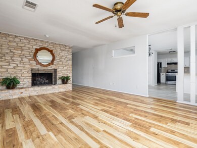 Unfurnished living room featuring light wood-styl