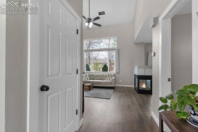 Entry way with under the stairs closet for extra s