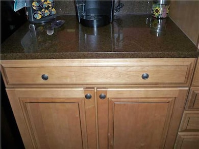 Kitchen. Convenient serving area next to the fridg