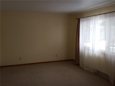 LIVING ROOM has large picture window and wall to w