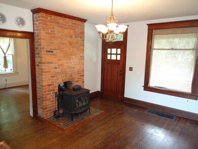 Exposed Brick--Wood Burning Stove