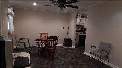 This room can be a den, dining room or or even an 