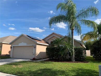 Front yard with beautiful palm tree.