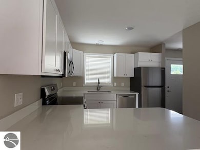 3796 Woodgate Dr unit 2, Traverse City, MI 49686 - photo 5