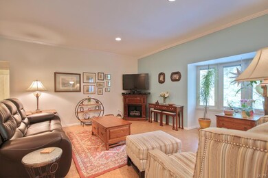 Spacious living room w/gel fireplace and bay windo