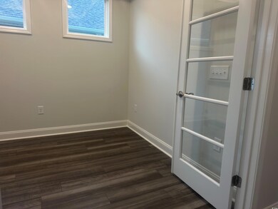 Unfurnished room with LVP flooring