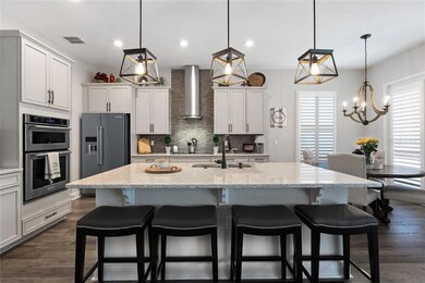 Kitchen with Stainless Steel KitchenAid appliance package