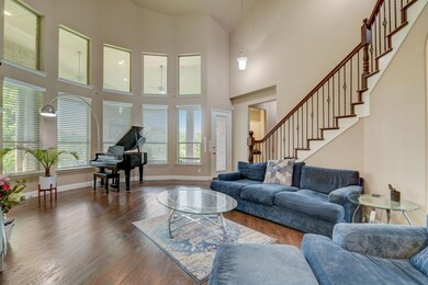 Living room featuring a wealth of natural light, a