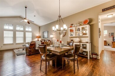 Dining space featuring ceiling fan, ornamental mo