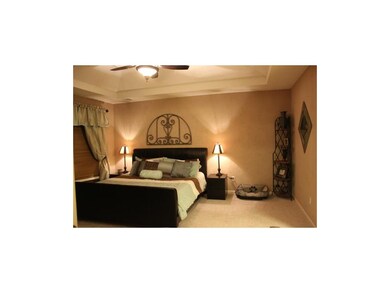 Spacious Master Bedroom has vaulted ceilings, a ba
