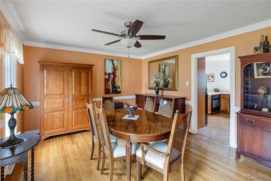 Formal dining room has beautiful hardwood floors,
