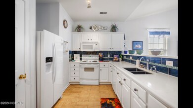 Kitchen with ceramic tile floor