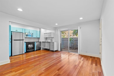 Kitchen with appliances with stainless steel finis