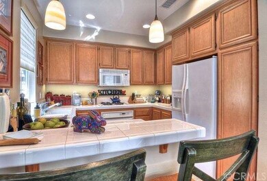 Breakfast bar with upgraded pendulum lighting. 