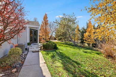 View of grassy yard with french doors