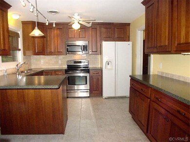 Breakfast bar next to sunroom.