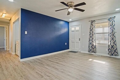 Spare room with light wood-type flooring and ceili