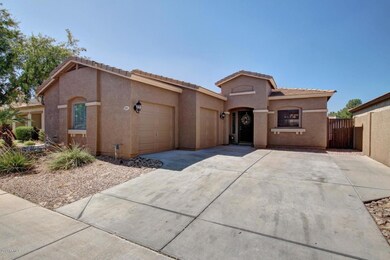 Front with wide driveway