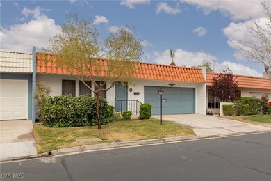 View of front of property with driveway, an attach
