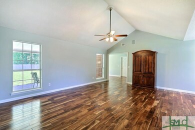 Great room with high ceilings, gorgeous wood floor