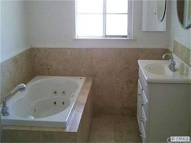 bathroom with jet tub