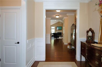 Entry - Open floor plan, hardwood floors, coat clo