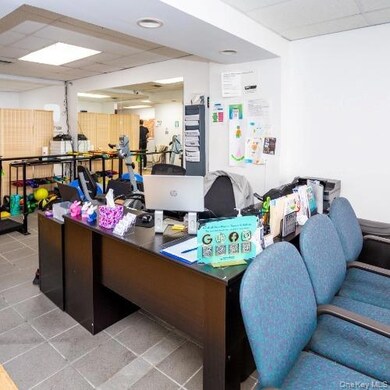 Office featuring a paneled ceiling