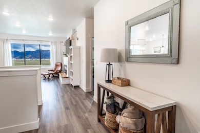 Breathtaking views of the Wellsville mountains upon entering through these huge windows