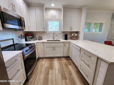 1800 the Greens Way unit 1004, Jacksonville Beach, FL 32250 - photo 2