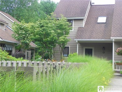Unit 2 is adjacent to the in-ground swimming pool