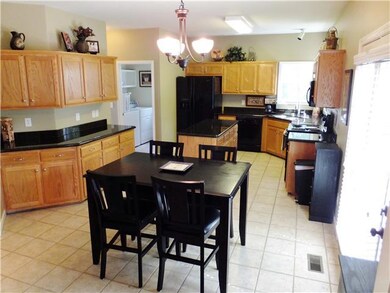 This well appointed Kitchen with Tile Floors and Granite Counter Tops will be a dream come true for the Chef in the house. Plenty on Counter Space & Open to the Great Room.