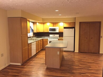 View of kitchen from dining room