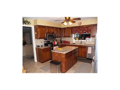 Kitchen has Stainless Appliances & Garden Window!