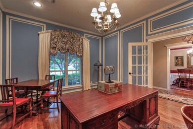French Doors open to the Handsome Office featuring
