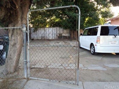Left side, big driveway